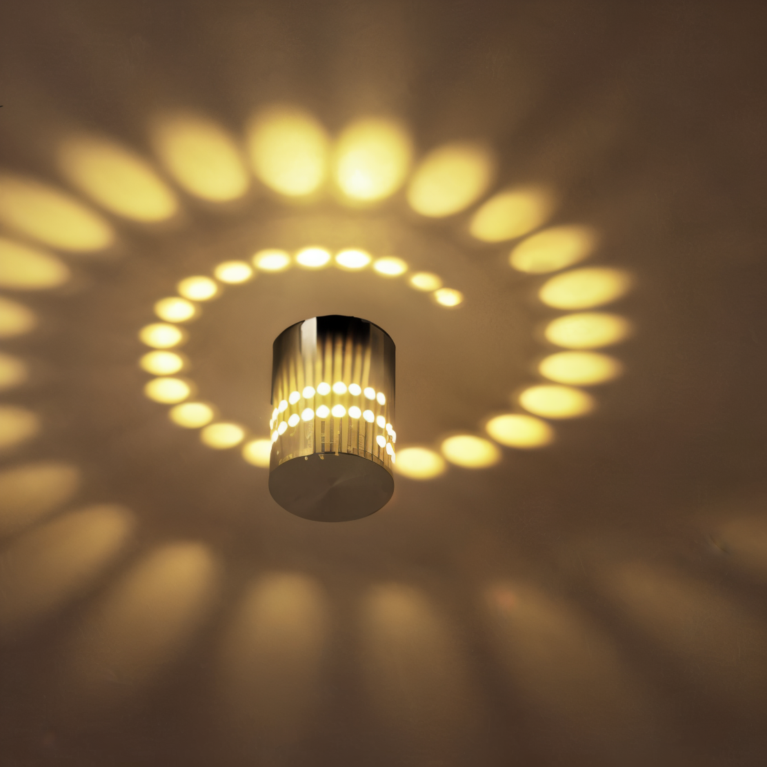 Lythera | Zylindrische LED Wandleuchte met gekleurde spiraalverlichting