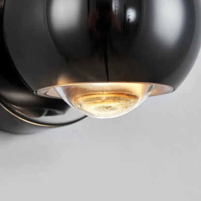 Orbis LED-wandlamp – draaibare bolvormige lamp in zwart met 360° lichtuitlijning